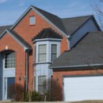 Asphalt shingles installed on large home
