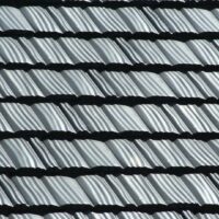 Close up of Metal Shake roofing panel in charcoal