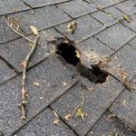 Hole in roof caused from storm damage