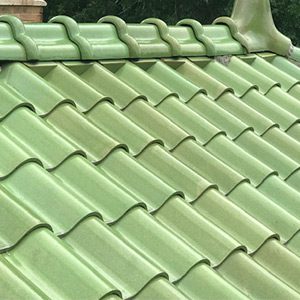 Close up of Spanish tile roof in glazed green