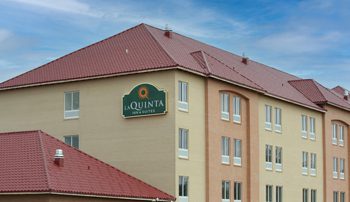 La Quinta Inn with red Metal Tile roof panels
